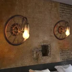 Applique steampunk inspirée d'une roue d'antan
