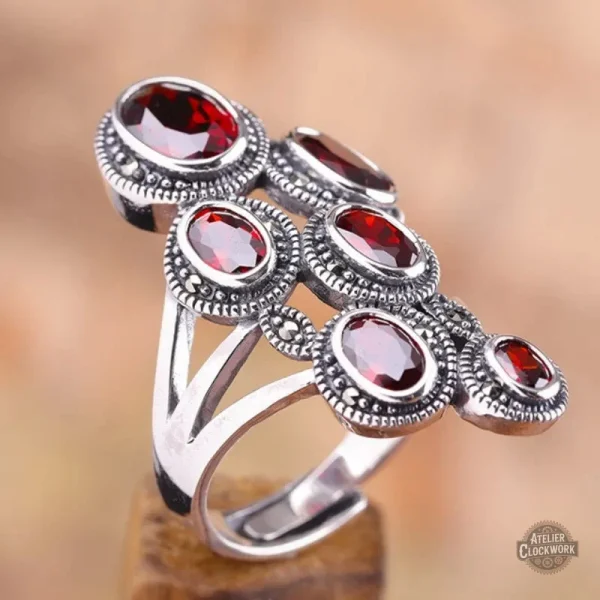 Bijou steampunk femme avec grenats en argent