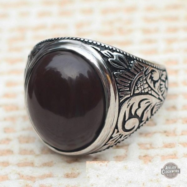 Bague dandy élégante avec pierre noire
