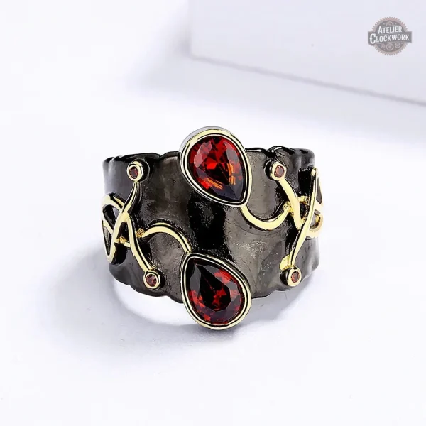 Bague Steampunk Femme en noir et or élégant