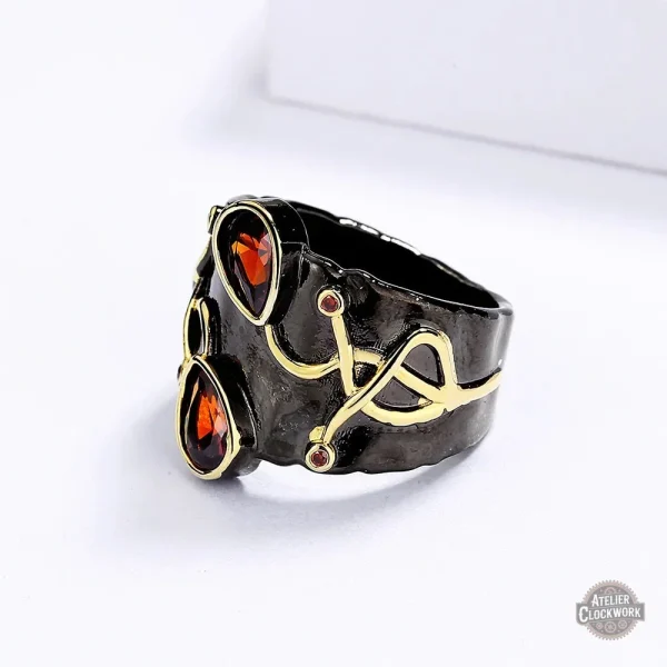 Bijou gothique femme, design noir et doré