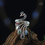 Bague steampunk inspirée du paon en argent