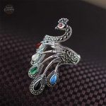 Accessoire steampunk femme avec motif de paon