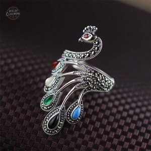 Accessoire steampunk femme avec motif de paon