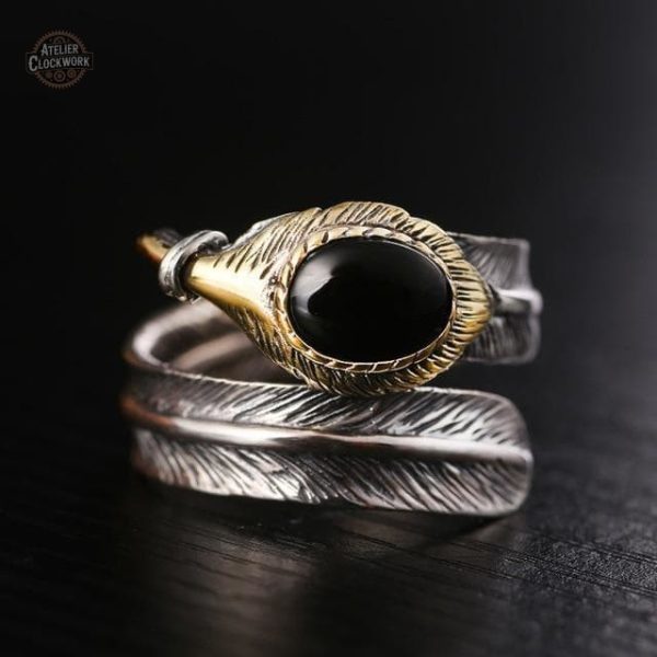 Bague dandy Steampunk avec motif plume