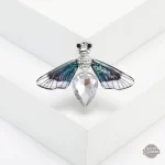 Bijou broche insecte pour un look intemporel
