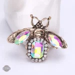Broche artistique insecte inspirée du steampunk