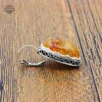 Création unique de boucles d'oreilles Ambre