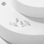 Accessoire steampunk : boucles d'oreilles élégantes en argent