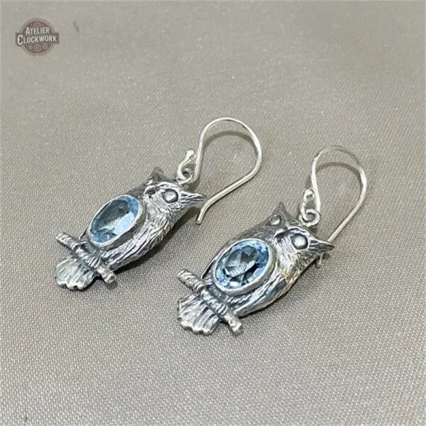 Création originale de boucles d'oreilles hibou