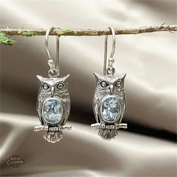 Design unique de boucles d'oreilles hibou