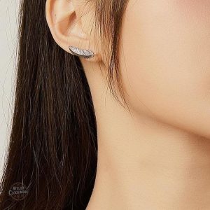 Boucles d'oreilles steampunk avec plumes élégantes