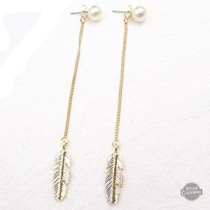 Boucles Steampunk en plumes dorées