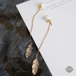 Accessoire femme Steampunk avec plumes dorées