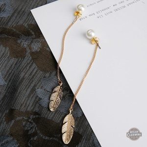 Accessoire femme Steampunk avec plumes dorées