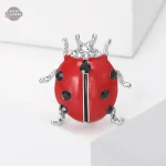 Accessoire coccinelle unique dans un style steampunk