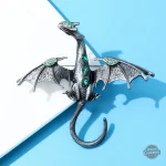 Broche artistique dragon, fusion du passé et futur
