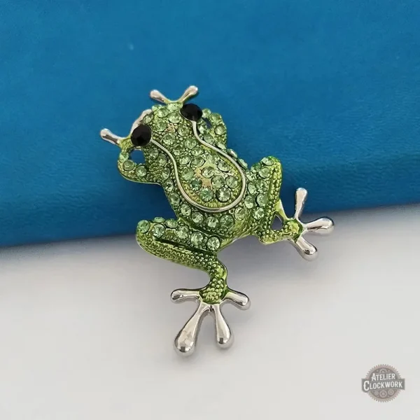 Broche élégante représentant un prince du marais