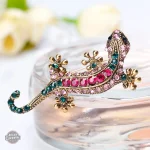 Accessoire féminin steampunk, broche reptile