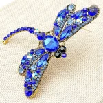 Broche élégante femme libellule steampunk