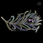 Broche plume rétro inspirée par le style steampunk