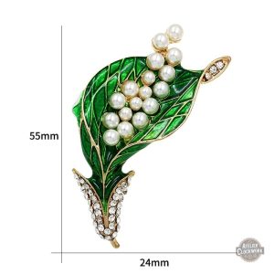 Broche au design steampunk, émail vert sur une base délicate