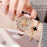 Élégante montre rose pour un look steampunk féminin