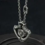Pendentif coeur avec éléments mécaniques