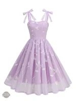Robe à bretelles nouées, look rétro chic